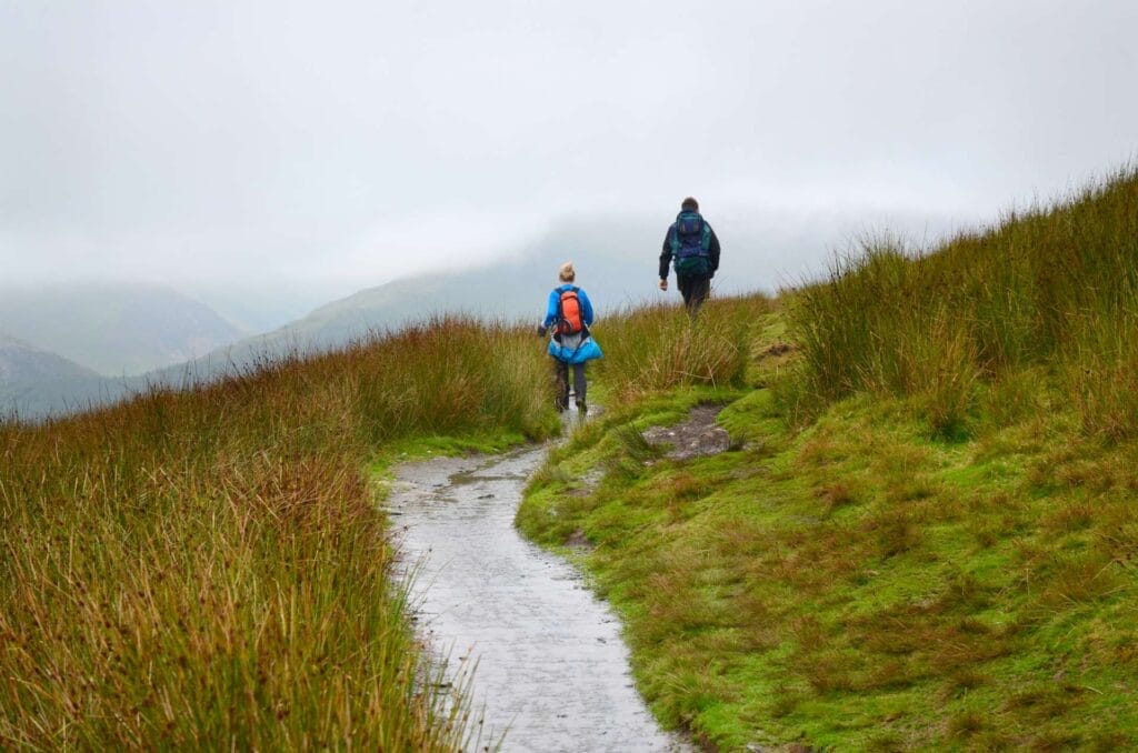 a young couple hiking in scotland